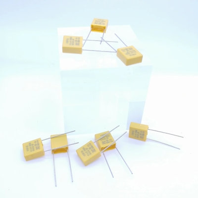 Colore giallo resistente e capacitivo del condensatore 0.1UF 310V P7.5MM di limitazione della pressione